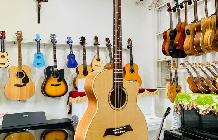 Mua mua đàn guitar acoustic giá rẻ chỉ 5 triệu