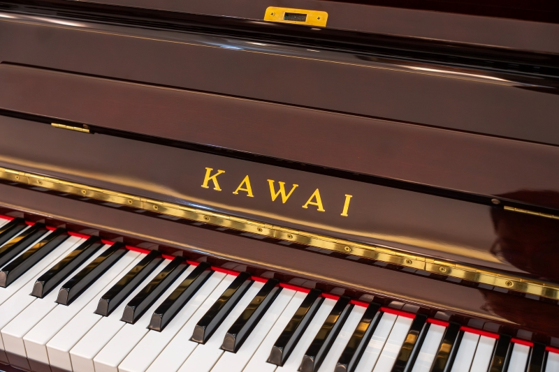 Bàn giao piano cơ Kawai BL61 Mahogany tại Quận 8