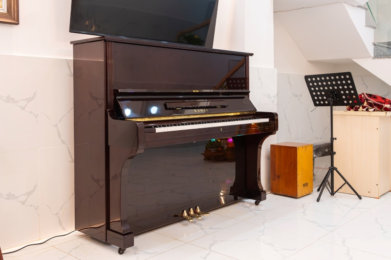 Bàn giao piano cơ Kawai BL61 Mahogany tại Quận 8